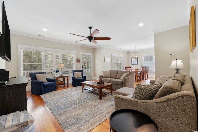 43 Sandlapper Way, Pawleys Island, SC 29585 - living area with ornamental molding, ceiling fan, light wood-type flooring, and recessed lighting
