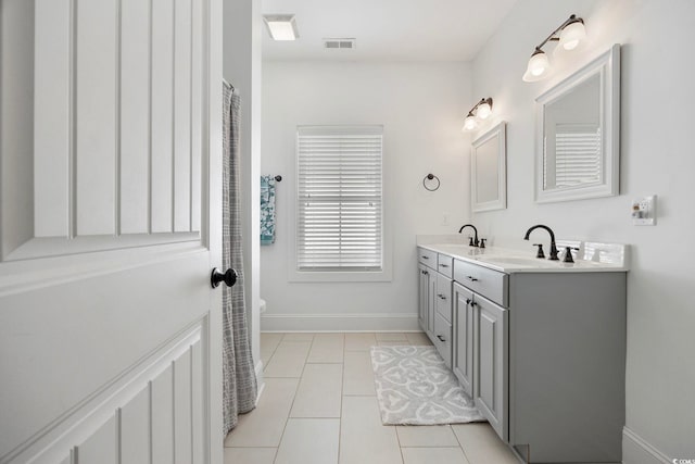 43 Sandlapper Way, Pawleys Island, SC 29585 - bathroom with double vanity and tile patterned floors