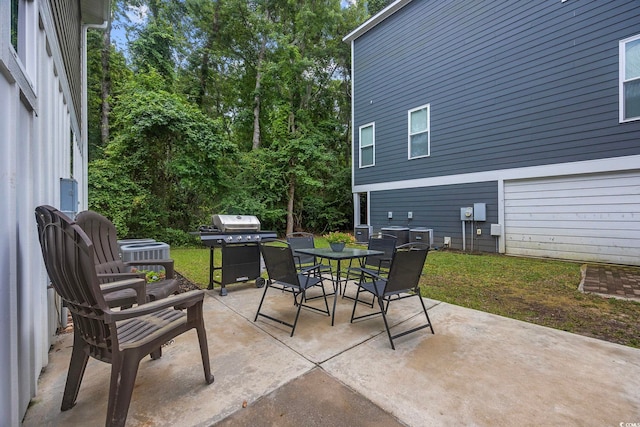 43 Sandlapper Way, Pawleys Island, SC 29585 - view of patio featuring outdoor dining space and grilling area