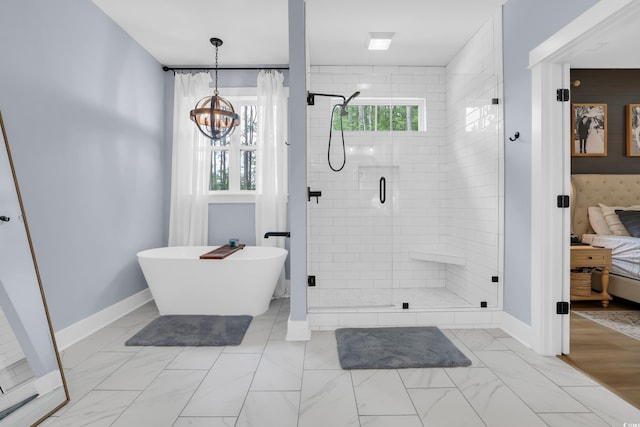 141 Evans Branch Ct, Galivants Ferry, SC 29544 - bathroom with a stall shower, a freestanding tub, connected bathroom, a chandelier, and marble finish floors
