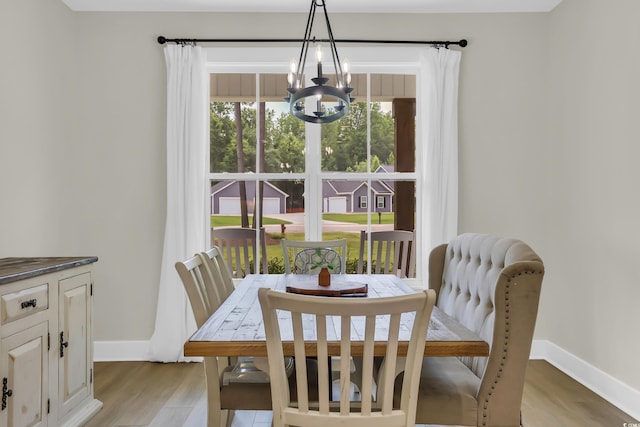 141 Evans Branch Ct, Galivants Ferry, SC 29544 - dining room with a chandelier and light wood-style floors