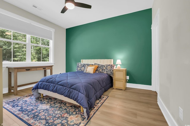 141 Evans Branch Ct, Galivants Ferry, SC 29544 - bedroom with light wood finished floors and a ceiling fan