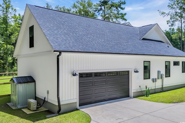 141 Evans Branch Ct, Galivants Ferry, SC 29544 - view of side of property featuring a shingled roof, driveway, and a garage