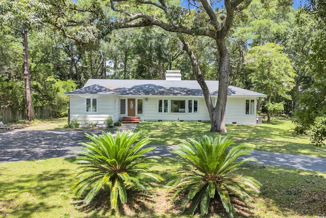 231 Live Oak Ln, Myrtle Beach, SC 29572 - ranch-style house featuring a chimney, entry steps, crawl space, and view of scattered trees