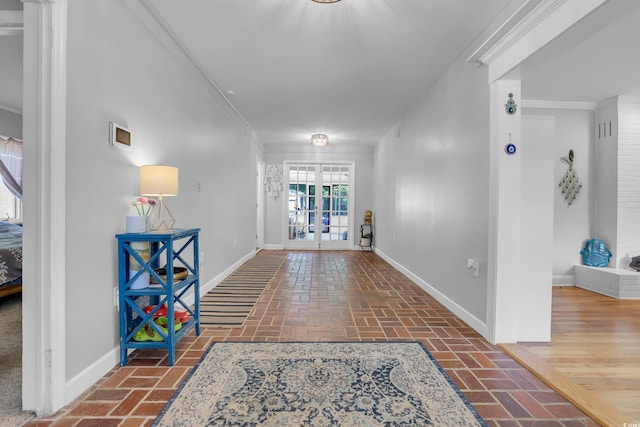 231 Live Oak Ln, Myrtle Beach, SC 29572 - hall featuring brick flooring, crown molding, and french doors