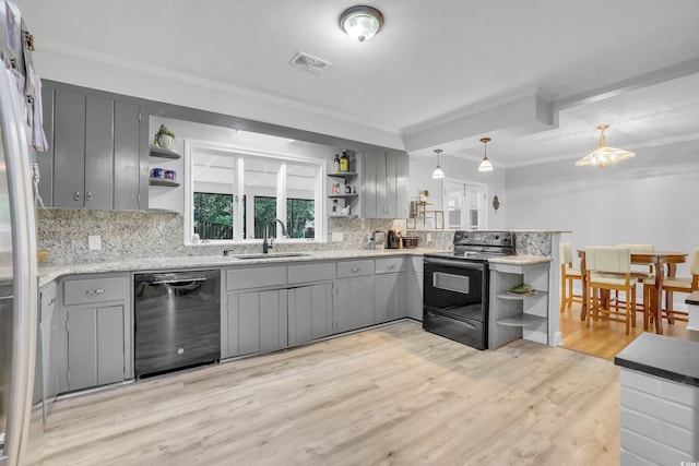 231 Live Oak Ln, Myrtle Beach, SC 29572 - kitchen with open shelves, dishwashing machine, black range with electric stovetop, gray cabinetry, and ornamental molding