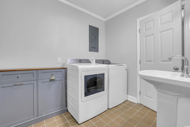 231 Live Oak Ln, Myrtle Beach, SC 29572 - laundry area featuring electric panel, independent washer and dryer, crown molding, light tile patterned floors, and cabinet space