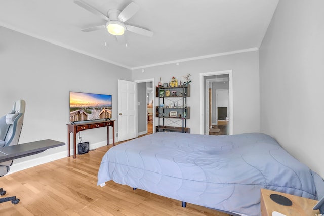 231 Live Oak Ln, Myrtle Beach, SC 29572 - bedroom featuring ornamental molding, wood finished floors, and a ceiling fan