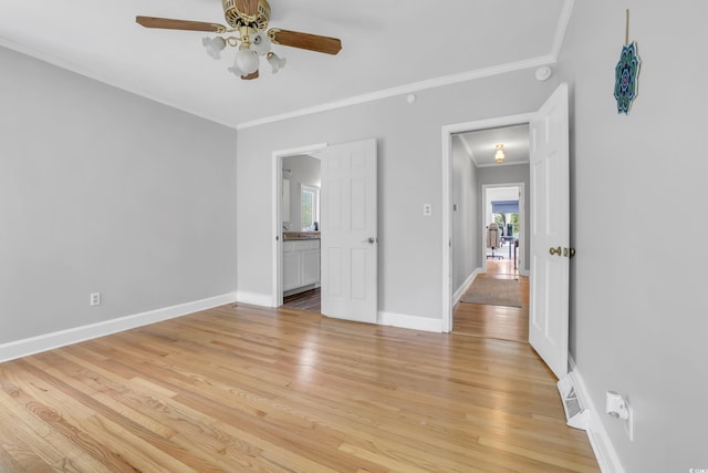 231 Live Oak Ln, Myrtle Beach, SC 29572 - empty room featuring a ceiling fan, ornamental molding, light wood-type flooring, and a smoke detector