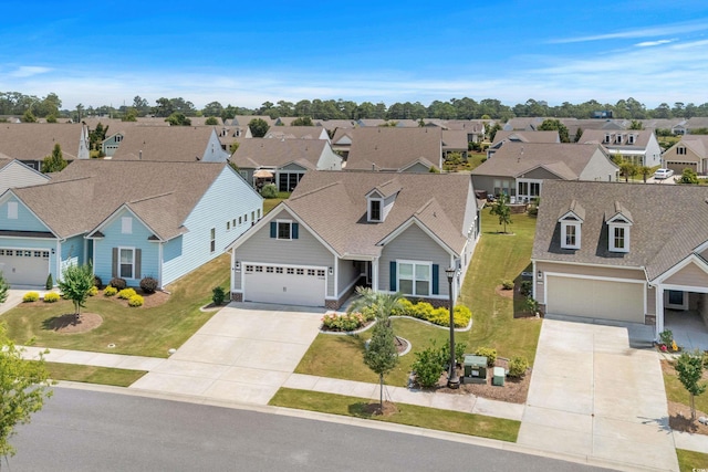 6550 Anterselva Dr, Myrtle Beach, SC 29572 - traditional-style house with driveway, a residential view, a front lawn, and roof with shingles