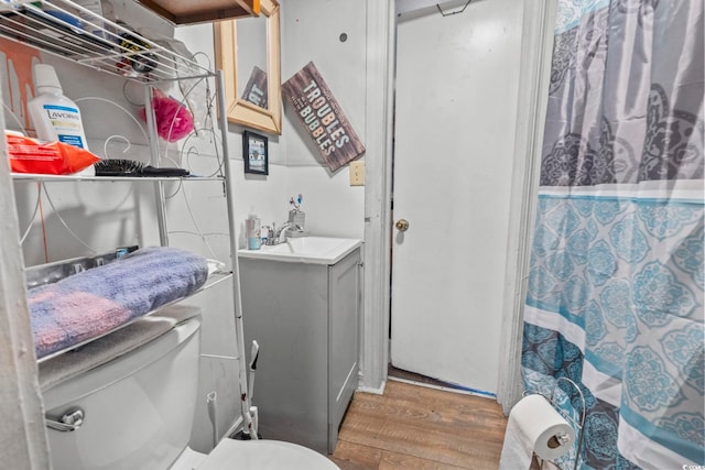 414 King St, Georgetown, SC 29440 - bathroom with wood finished floors, vanity, and curtained shower