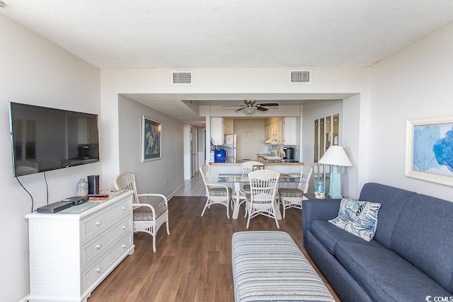 2101 S Ocean Blvd, North Myrtle Beach, SC 29582 - living room with wood finished floors and a ceiling fan