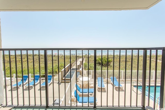2101 S Ocean Blvd, North Myrtle Beach, SC 29582 - balcony with view of pool and a water view