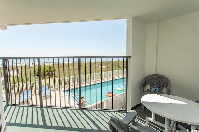 2101 S Ocean Blvd, North Myrtle Beach, SC 29582 - balcony featuring view of pool and a water view