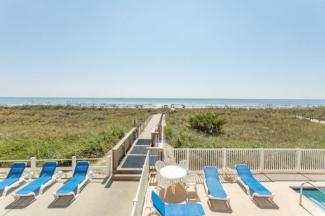 2101 S Ocean Blvd, North Myrtle Beach, SC 29582 - view of patio / terrace featuring view of water and beach