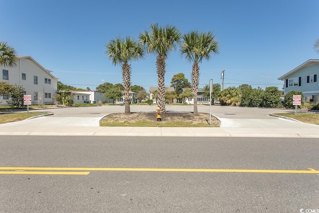 2101 S Ocean Blvd, North Myrtle Beach, SC 29582 - view of asphalt street featuring curbs and sidewalks