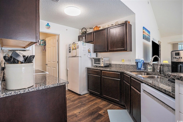 4925 Pond Shoals Ct Unit 202, Myrtle Beach, SC 29579 - kitchen with white appliances, dark wood-style floors, dark brown cabinets, dark stone countertops, and a textured ceiling