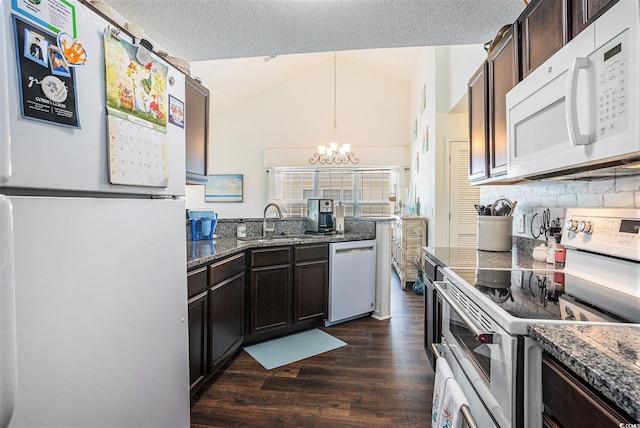 4925 Pond Shoals Ct Unit 202, Myrtle Beach, SC 29579 - kitchen with white appliances, a chandelier, dark wood-style floors, tasteful backsplash, and dark stone countertops