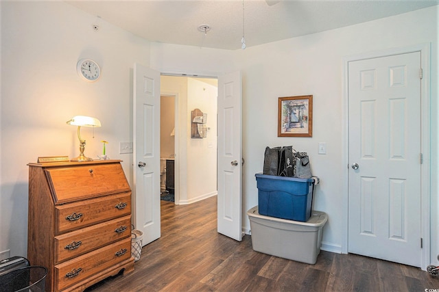 4925 Pond Shoals Ct Unit 202, Myrtle Beach, SC 29579 - bedroom with dark wood finished floors and baseboards