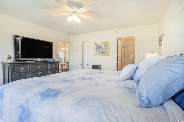 4925 Pond Shoals Ct Unit 202, Myrtle Beach, SC 29579 - bedroom with ensuite bath and a ceiling fan