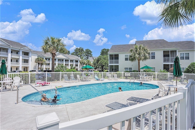 4925 Pond Shoals Ct Unit 202, Myrtle Beach, SC 29579 - community pool featuring a patio