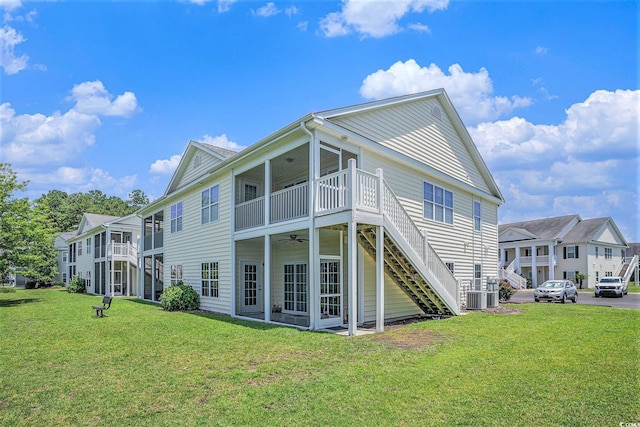 4925 Pond Shoals Ct Unit 202, Myrtle Beach, SC 29579 - rear view of property featuring stairway, a lawn, and ceiling fan