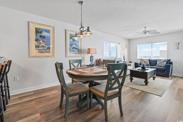2001 S Ocean Blvd Unit 901, North Myrtle Beach, SC 29582 - dining area with a textured ceiling, healthy amount of natural light, wood finished floors, and ceiling fan