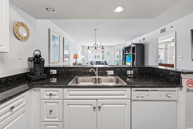 2001 S Ocean Blvd Unit 901, North Myrtle Beach, SC 29582 - kitchen featuring white dishwasher, healthy amount of natural light, white cabinets, and recessed lighting