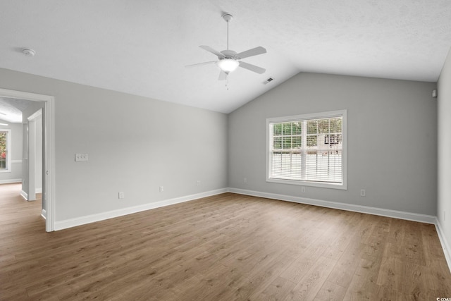 3845 Camden Dr, Myrtle Beach, SC 29588 - unfurnished room featuring ceiling fan, a smoke detector, wood finished floors, and vaulted ceiling