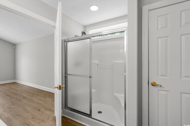 3845 Camden Dr, Myrtle Beach, SC 29588 - full bathroom with a stall shower and wood finished floors