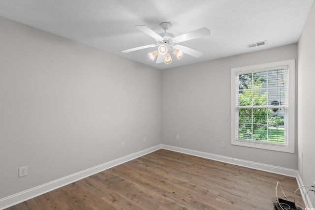 3845 Camden Dr, Myrtle Beach, SC 29588 - empty room with wood finished floors and a ceiling fan