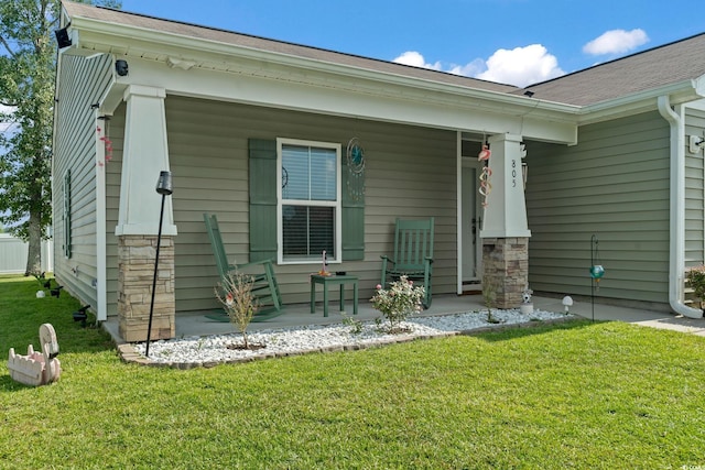 805 Spyderco Rd, Conway, SC 29527 - rear view of house with a porch and a lawn