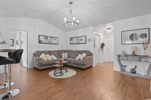 805 Spyderco Rd, Conway, SC 29527 - living room with lofted ceiling, a chandelier, and wood finished floors