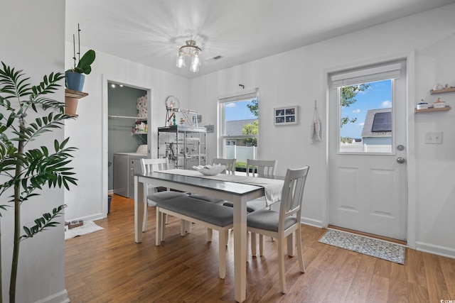 805 Spyderco Rd, Conway, SC 29527 - dining room featuring healthy amount of natural light, light wood-style floors, and washer and clothes dryer