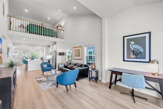 8906 Freya Way Unit 24A, Longs, SC 29568 - living area with light wood finished floors, high vaulted ceiling, recessed lighting, and a desk