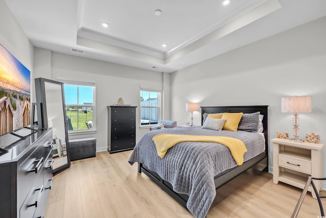 8906 Freya Way Unit 24A, Longs, SC 29568 - bedroom featuring a raised ceiling, light wood-style floors, and recessed lighting