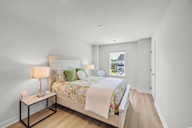 8906 Freya Way Unit 24A, Longs, SC 29568 - bedroom with wood finished floors and baseboards