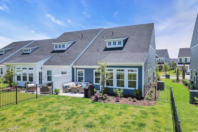 8906 Freya Way Unit 24A, Longs, SC 29568 - rear view of house featuring an outdoor hangout area, a fenced backyard, a patio, and a shingled roof