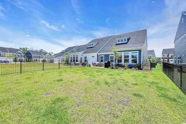 8906 Freya Way Unit 24A, Longs, SC 29568 - rear view of house featuring a fenced backyard, a residential view, and a shingled roof