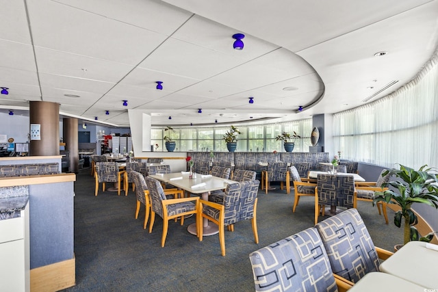 304 N Ocean Blvd Unit 1402, North Myrtle Beach, SC 29582 - dining area with carpet floors