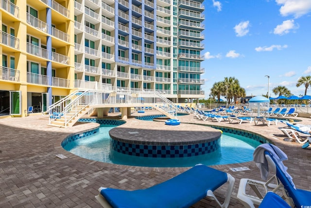 304 N Ocean Blvd Unit 1402, North Myrtle Beach, SC 29582 - community pool featuring a patio area