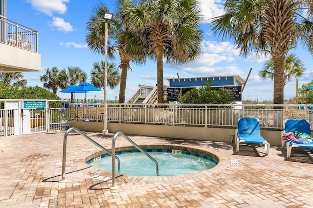 304 N Ocean Blvd Unit 1402, North Myrtle Beach, SC 29582 - view of swimming pool with a community hot tub