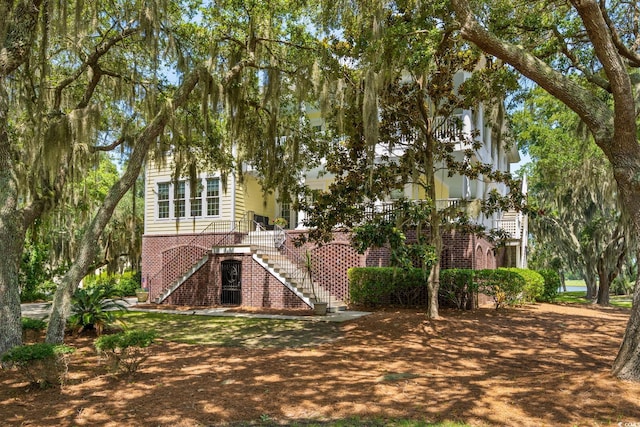 3085 Luvan Blvd, Georgetown, SC 29440 - rear view of property with brick siding and stairs