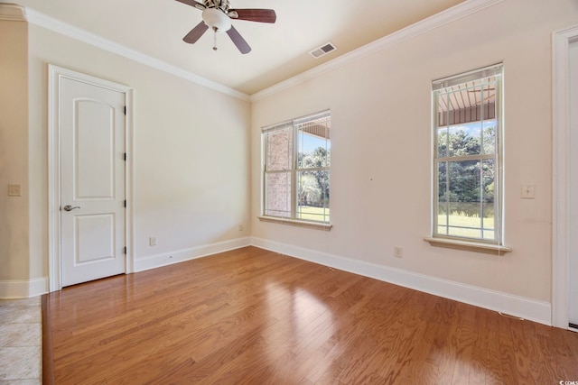 8444 Juxa Dr, Myrtle Beach, SC 29579 - spare room featuring wood finished floors, crown molding, and a ceiling fan