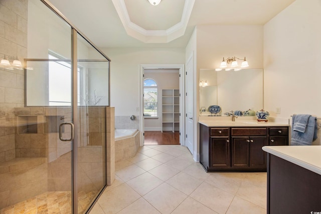 8444 Juxa Dr, Myrtle Beach, SC 29579 - bathroom with vanity, a garden tub, tile patterned floors, a shower stall, and a tray ceiling