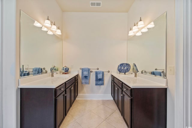 8444 Juxa Dr, Myrtle Beach, SC 29579 - full bath featuring two vanities and tile patterned floors