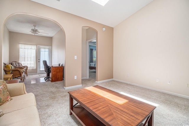 4530 Lighthouse Dr Unit 31-C, Little River, SC 29566 - living area featuring light colored carpet, arched walkways, an office area, ceiling fan, and vaulted ceiling