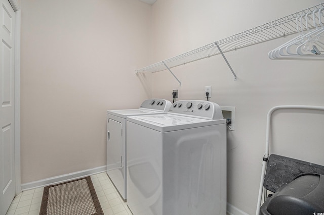 4530 Lighthouse Dr Unit 31-C, Little River, SC 29566 - laundry room with washer and dryer and baseboards