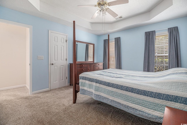 4530 Lighthouse Dr Unit 31-C, Little River, SC 29566 - bedroom featuring a raised ceiling, carpet flooring, and a ceiling fan