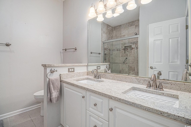 4530 Lighthouse Dr Unit 31-C, Little River, SC 29566 - bathroom featuring double vanity, tile patterned flooring, and a stall shower